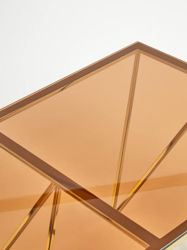 Red-Tinted Tempered Glass Top Coffee Table With Geometric Prismatic Champagne Metal Legs, Allure