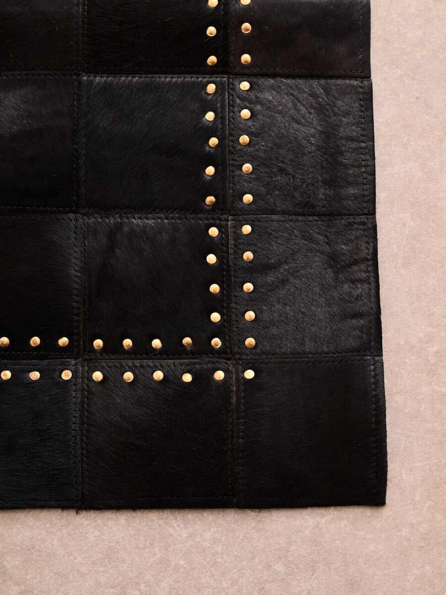 Bosie Safira Small Black Hair On Leather Patchwork Rug With Gold Studs