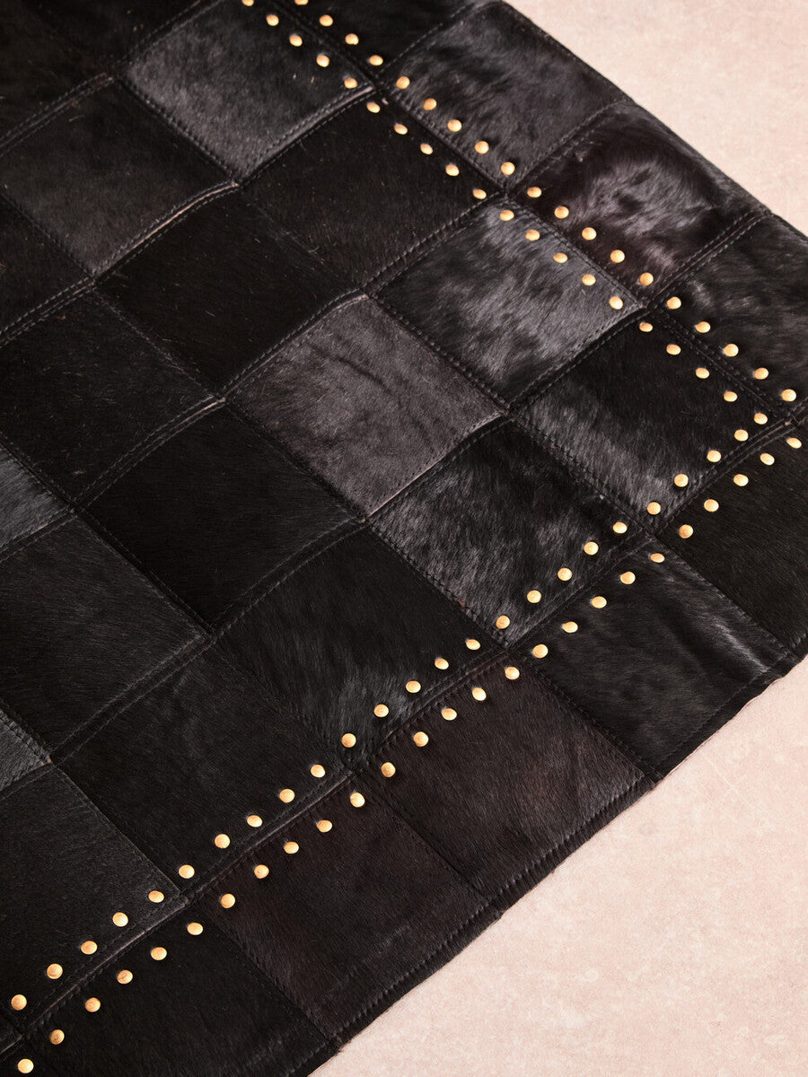 Bosie Safira Small Black Hair On Leather Patchwork Rug With Gold Studs